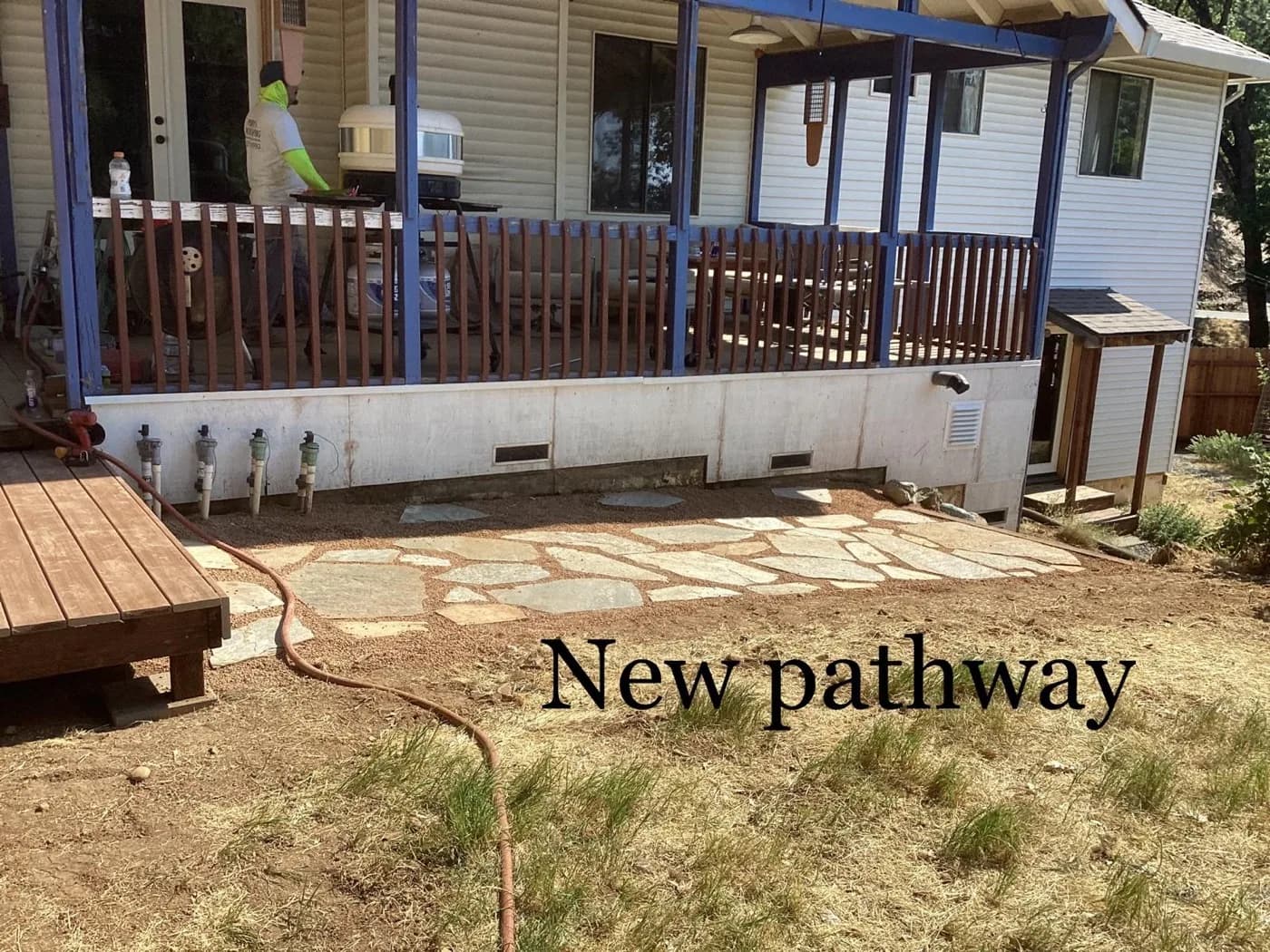 Flagstone patio we set beside a covered porch