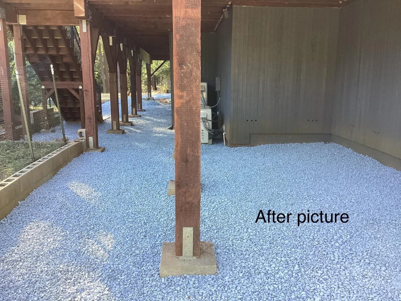 Drain rock we spread under a deck after putting in a French drain